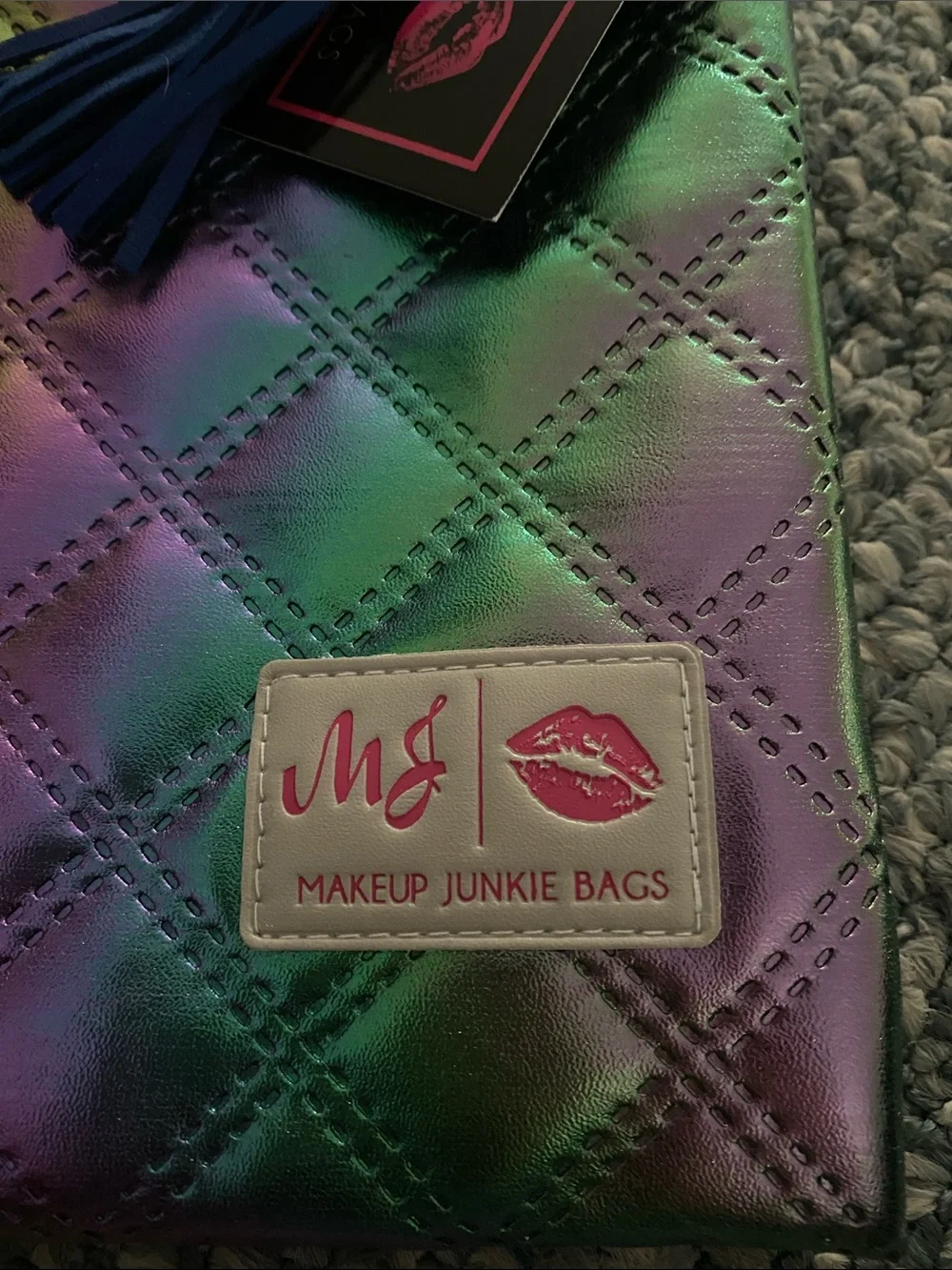 New with tags Makeup Junkie Jumbo Zip top Bag.  Quilted.  Multi Mermaid Luster.